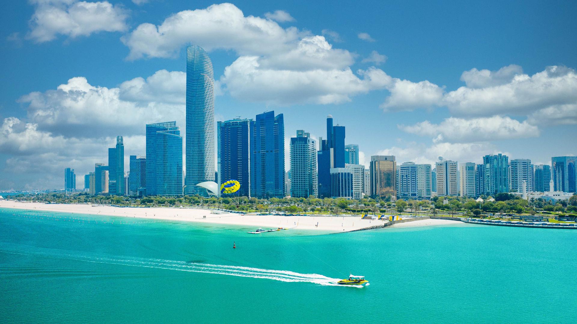 Skyline view of Abu Dhabi with turquoise water