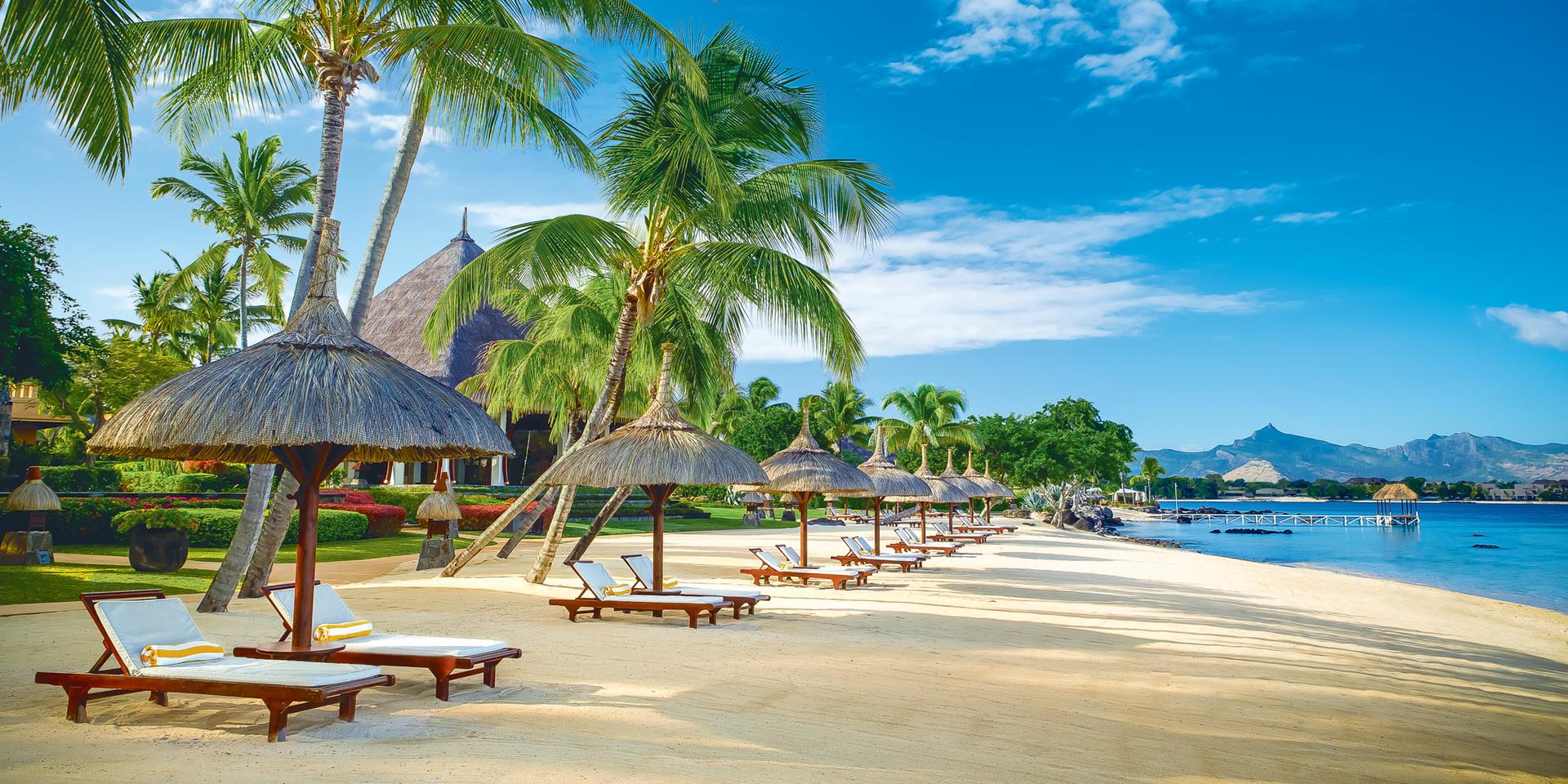 Mauritian beach with sun loungers