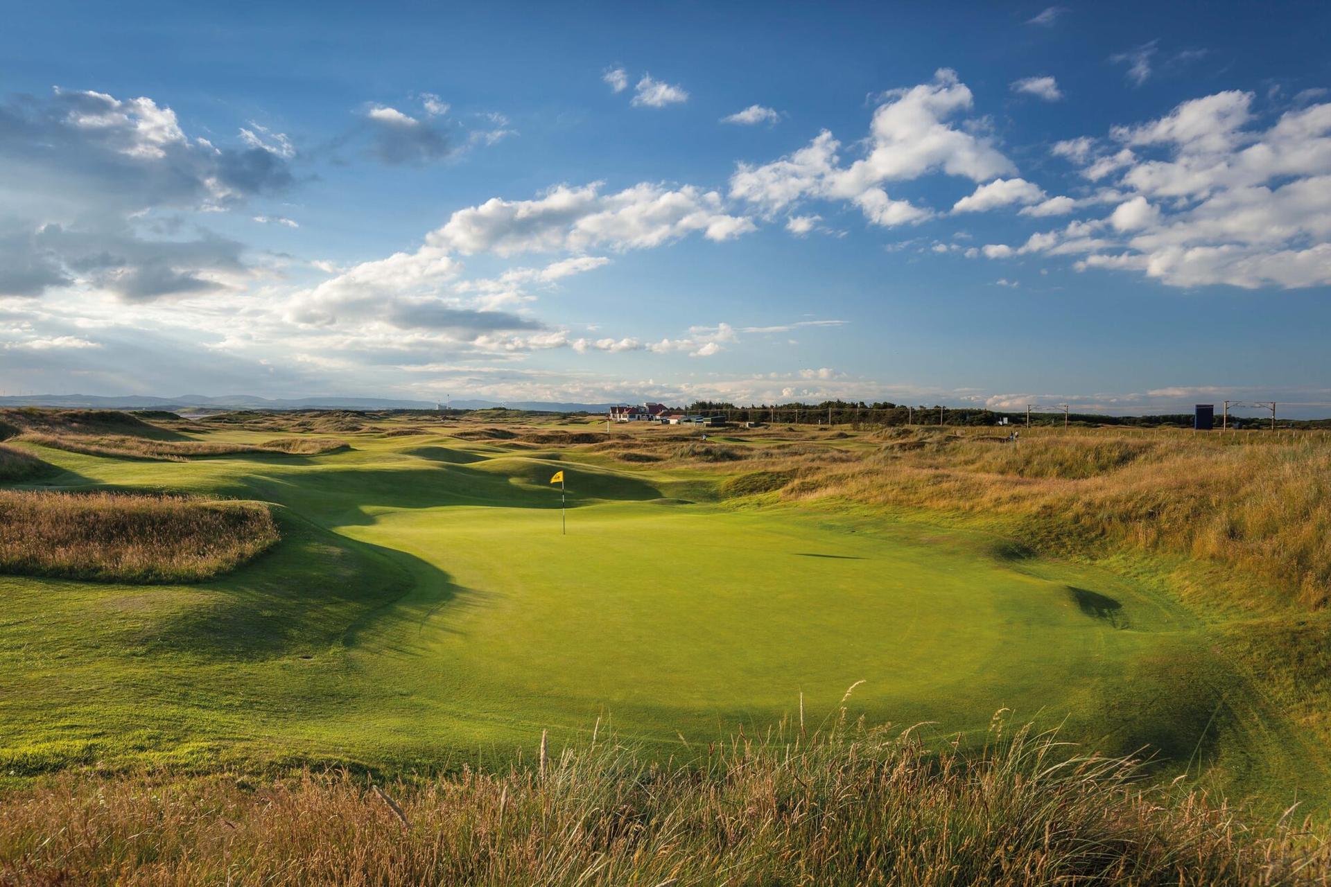 Sloping green surrounded by thick rough at Western Gailes