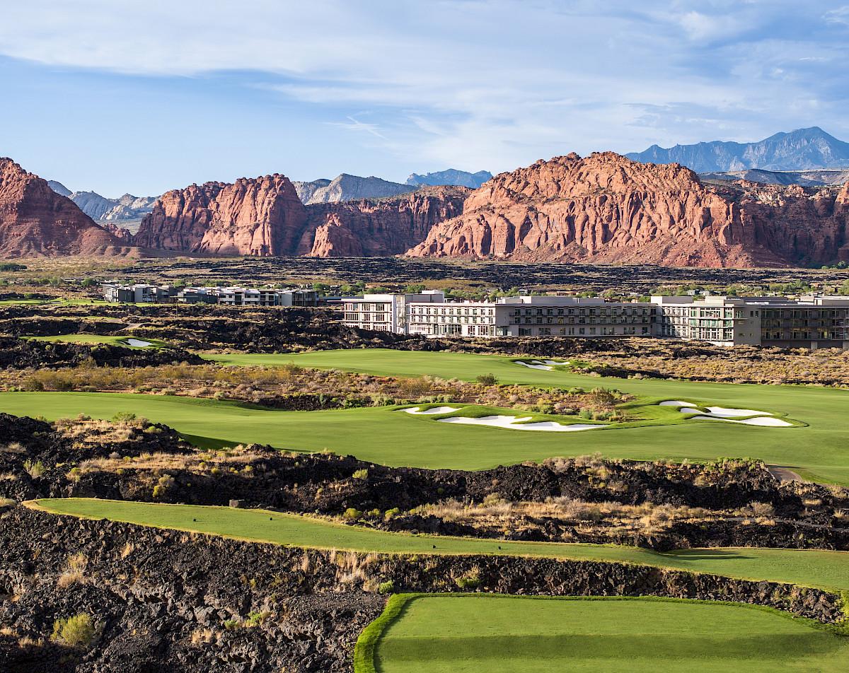 The Black Desert Resort looking over the golf course with a mountain towering over behind