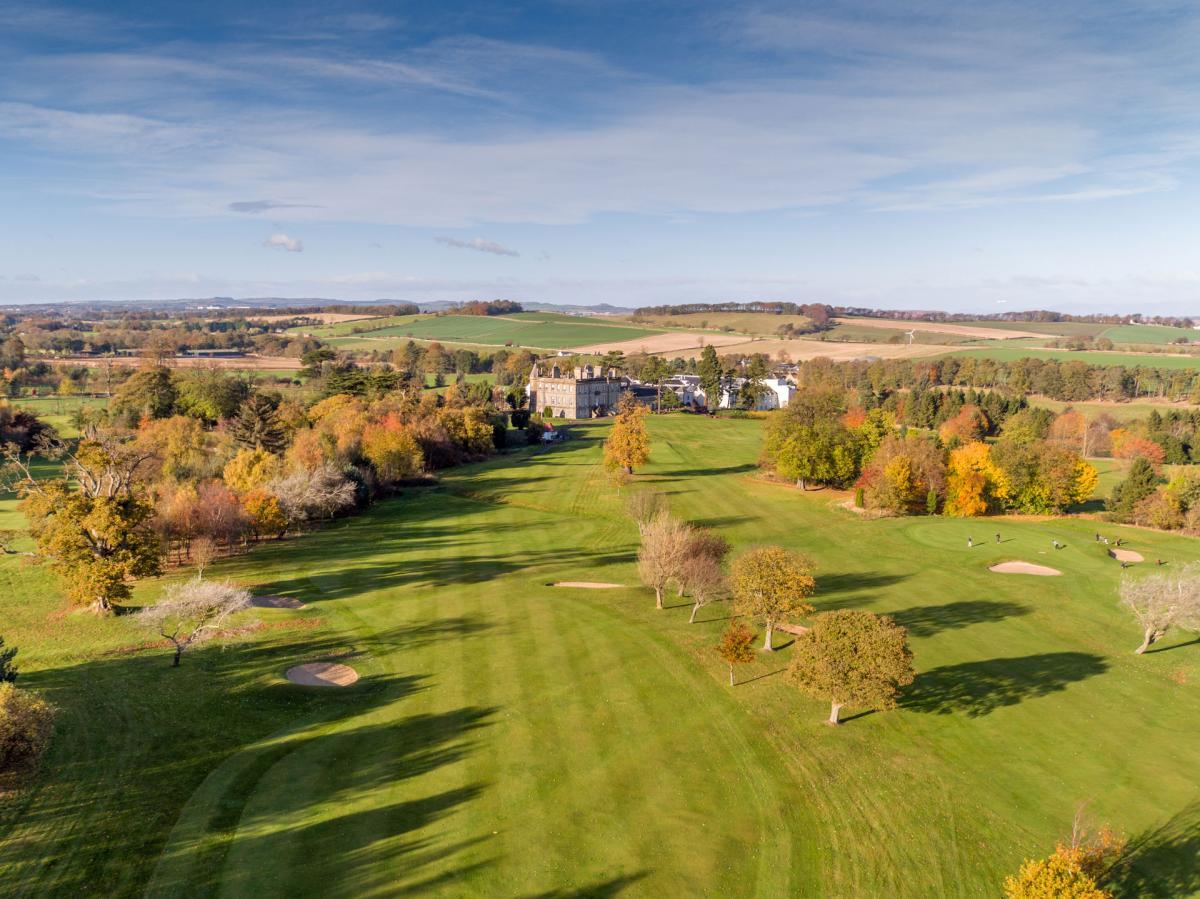 A beautiful aerial view of the course leading up to the historic Dalmahoy Hotel.