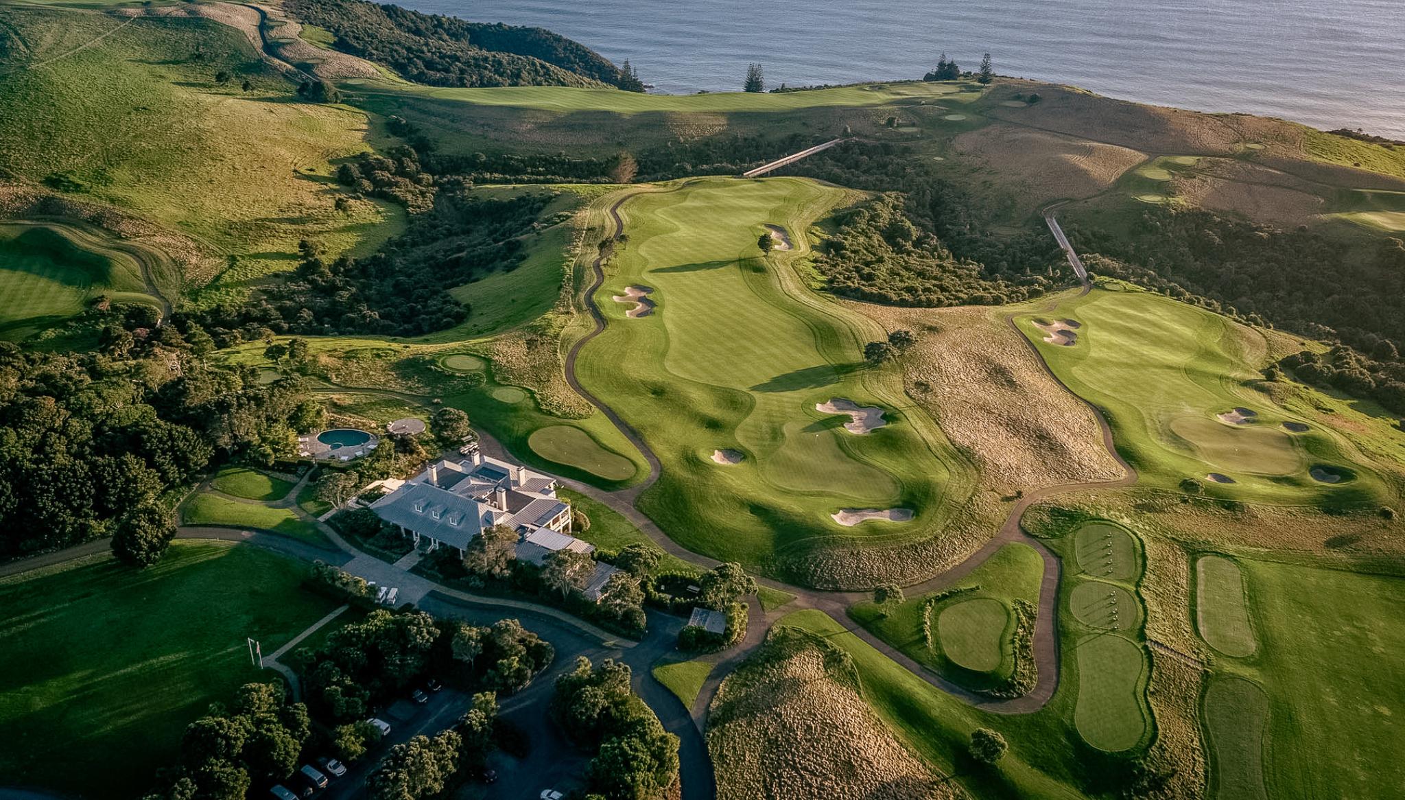 Birdseye view of the Kauri Cliffs Resort clubhouse overlooking their course