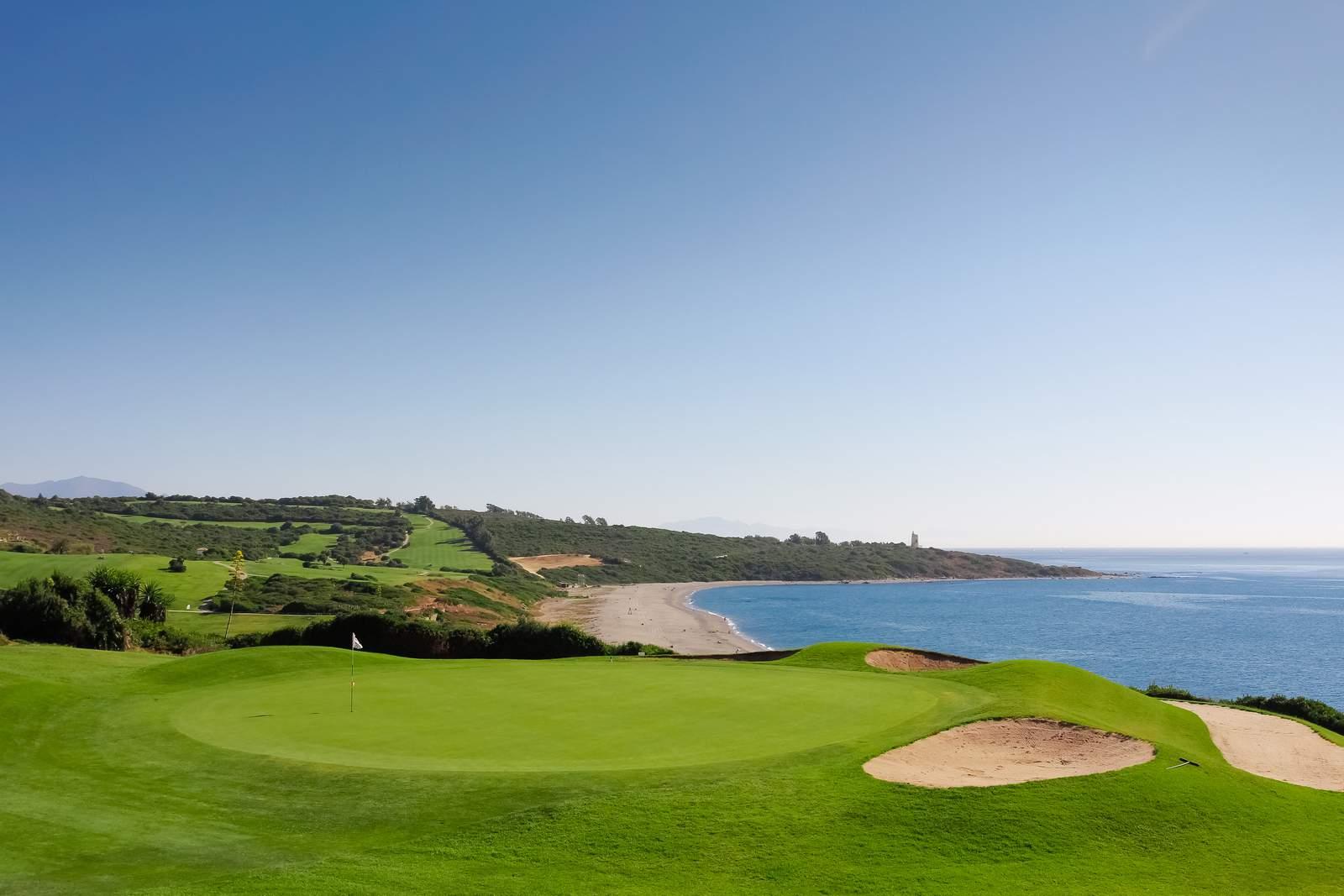 Pristine green overlooking the ocean