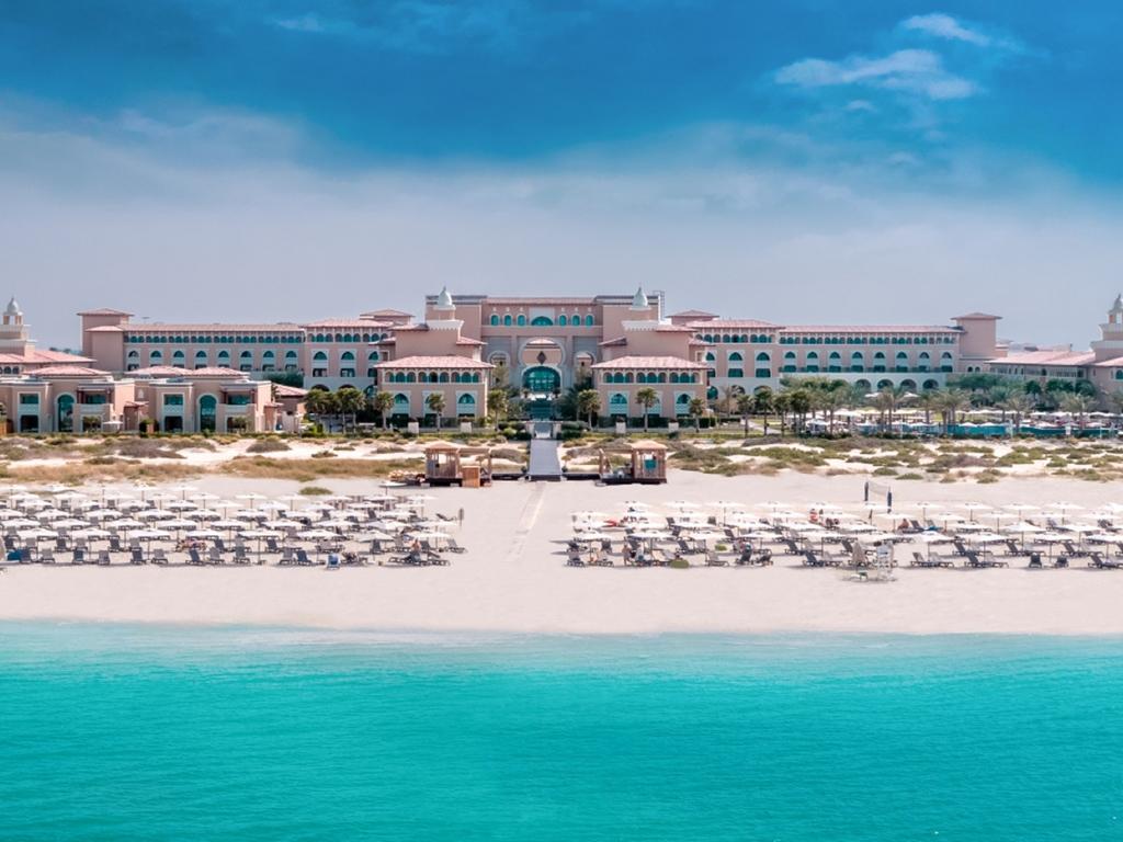 Overhead view of the hotels private section of the beach littered with sunbeds
