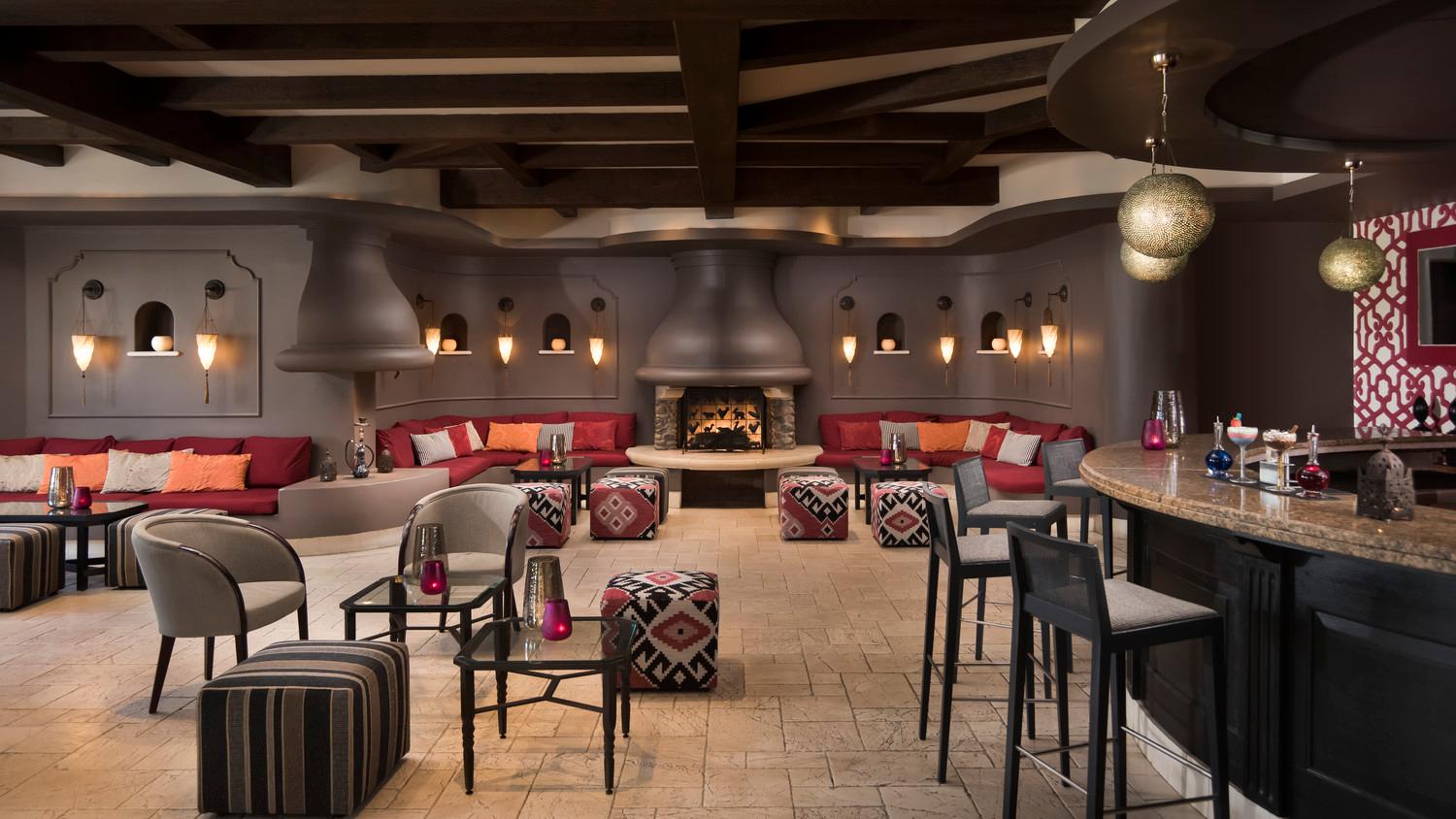 Empty bar area with fireplace