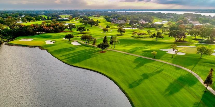 Birdseye view of the course showing its well maintained fairways nestled with sand bunkers