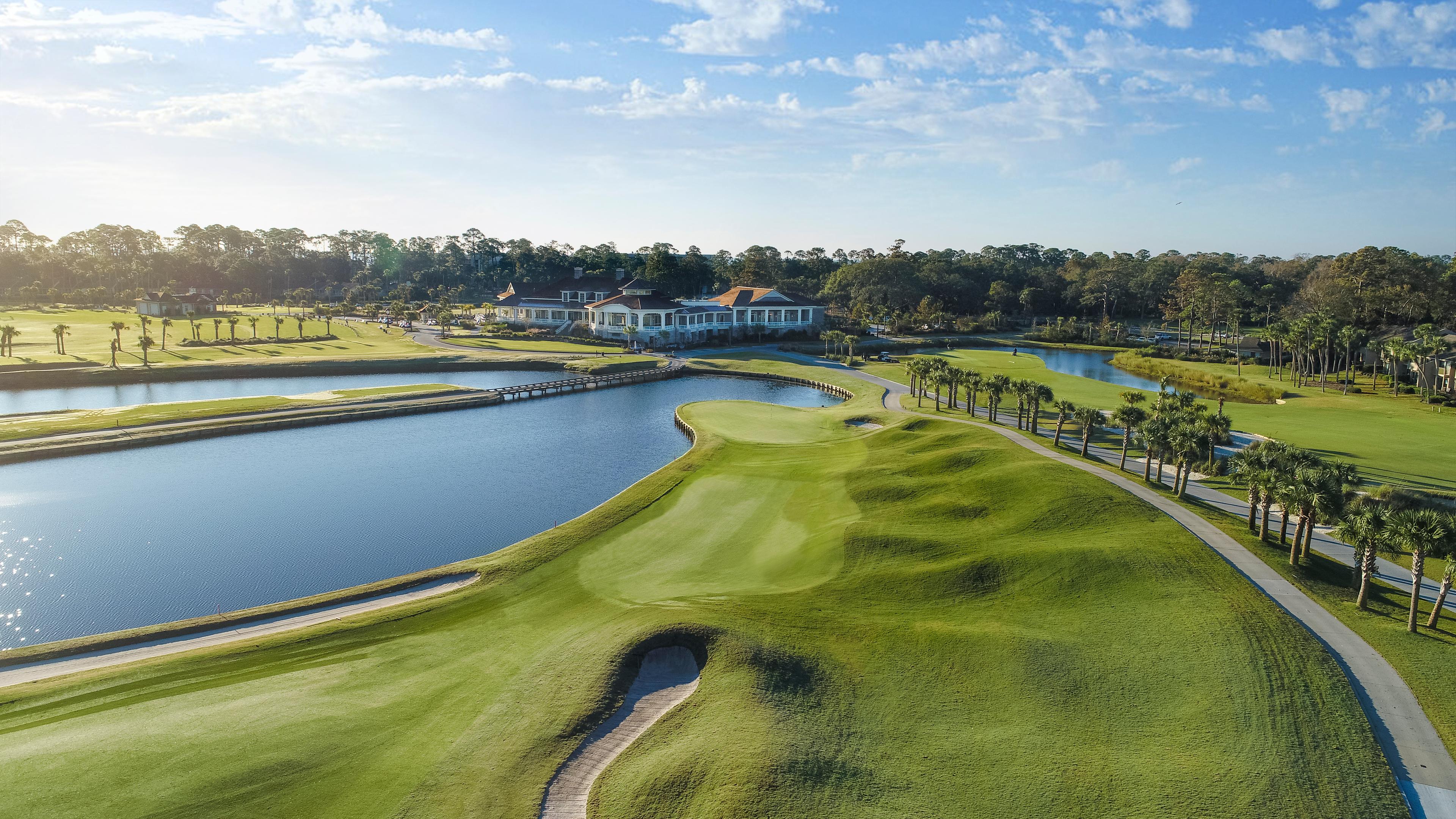 Aerial view of The Sea Pines Resort with its clubhouse looking over the course
