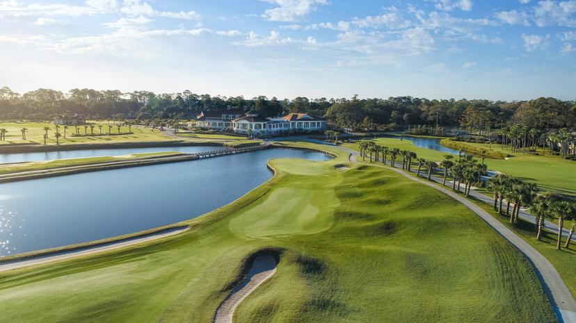 Aerial view of The Sea Pines Resort with its clubhouse looking over the course