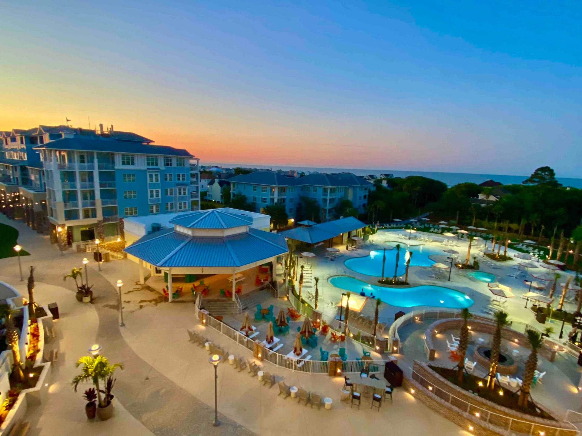 Overhead view of the on sight swimming pools at sunset