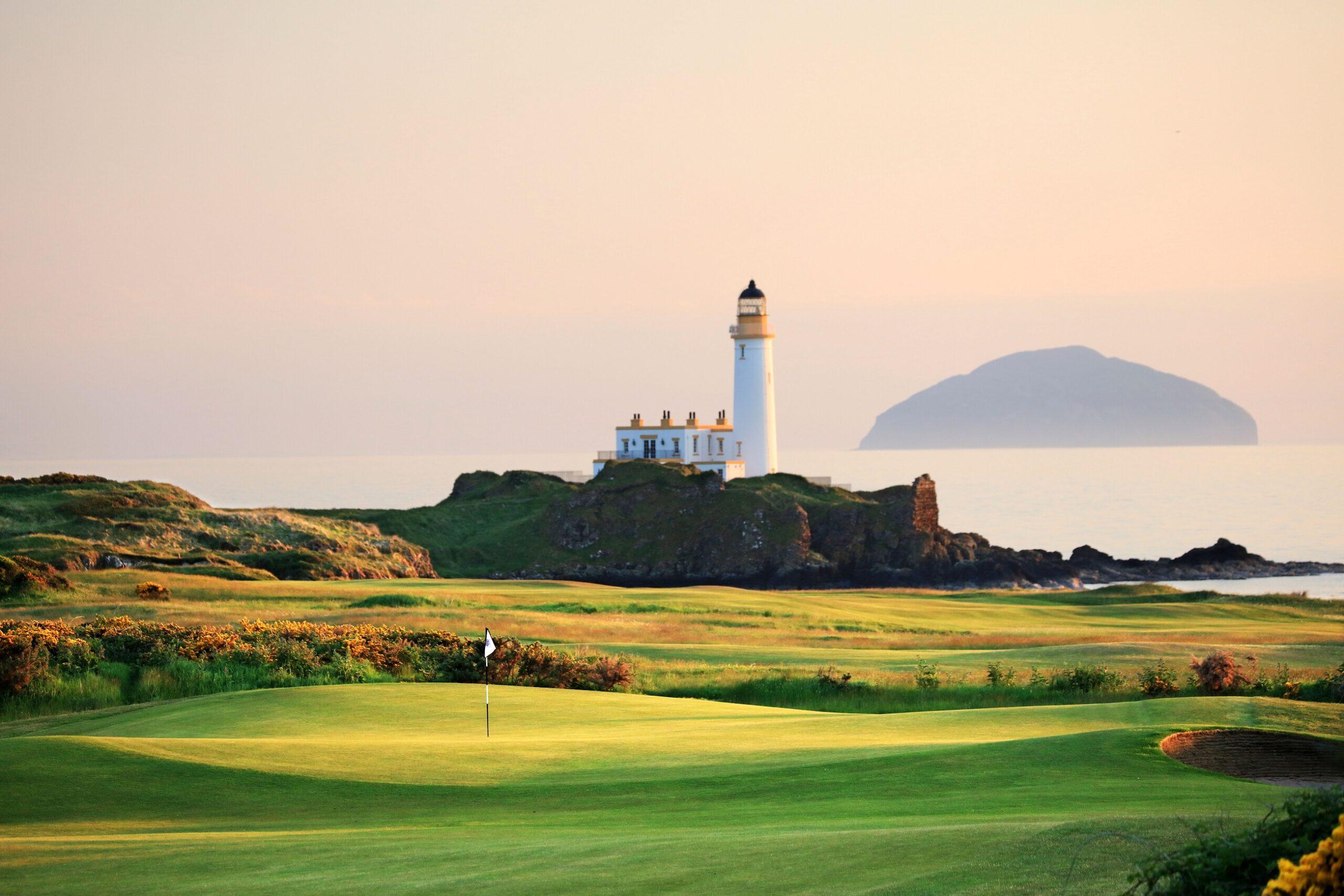 A beautiful sunset view of the iconic Turnberry Lighthouse overlooking the rolling greens.