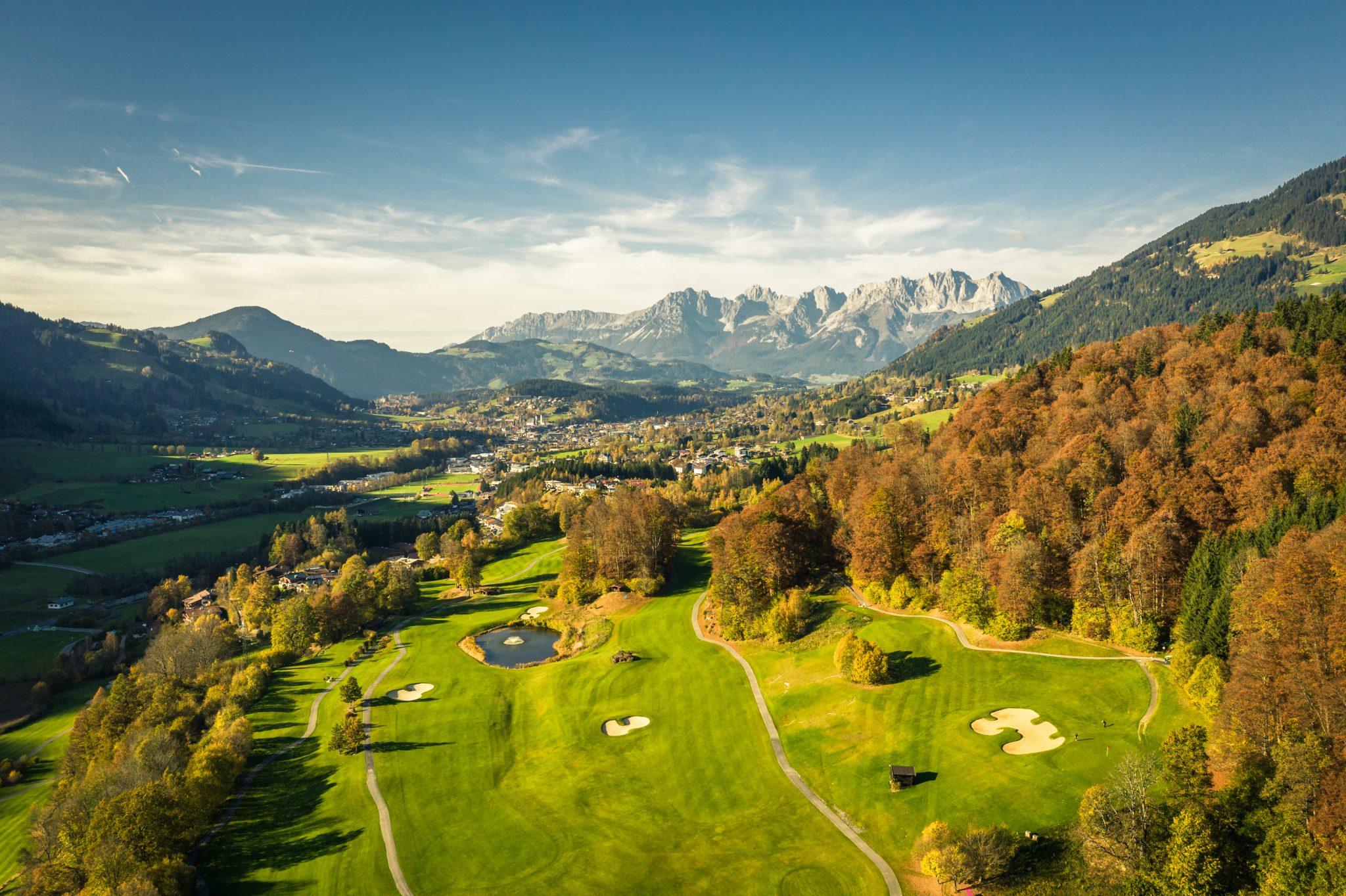 Overhead view of the Eichenheim golf course with mountain views in the distance