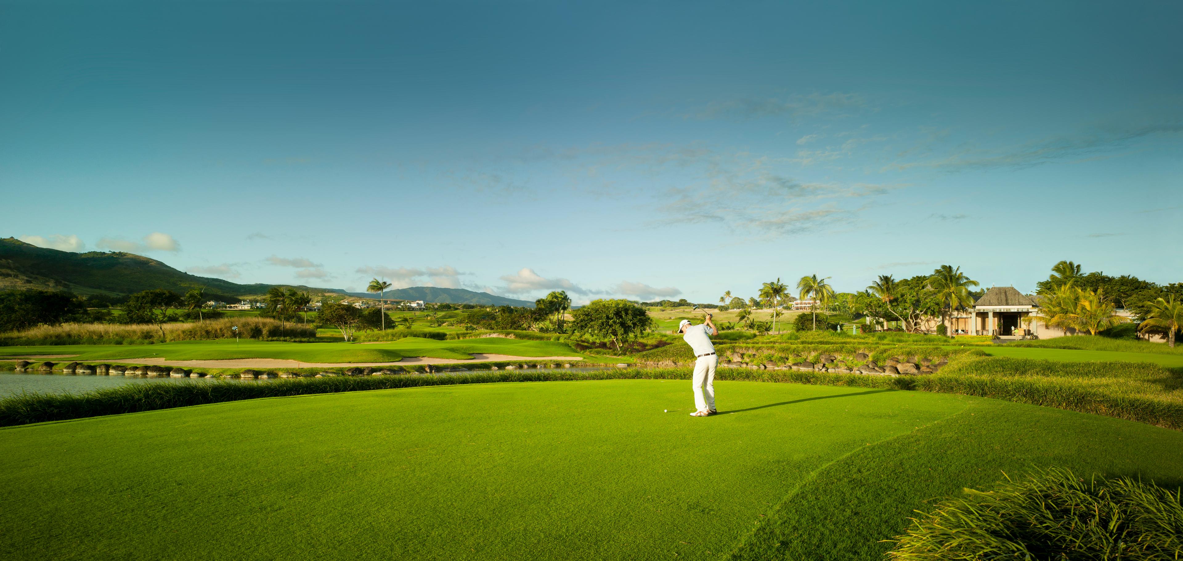 Golfer teeing off on the La Chateau Golf Course