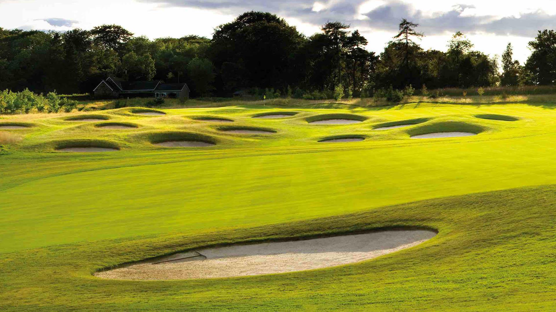 Multiple bunkers nestled around the greens at the Meldrum House course