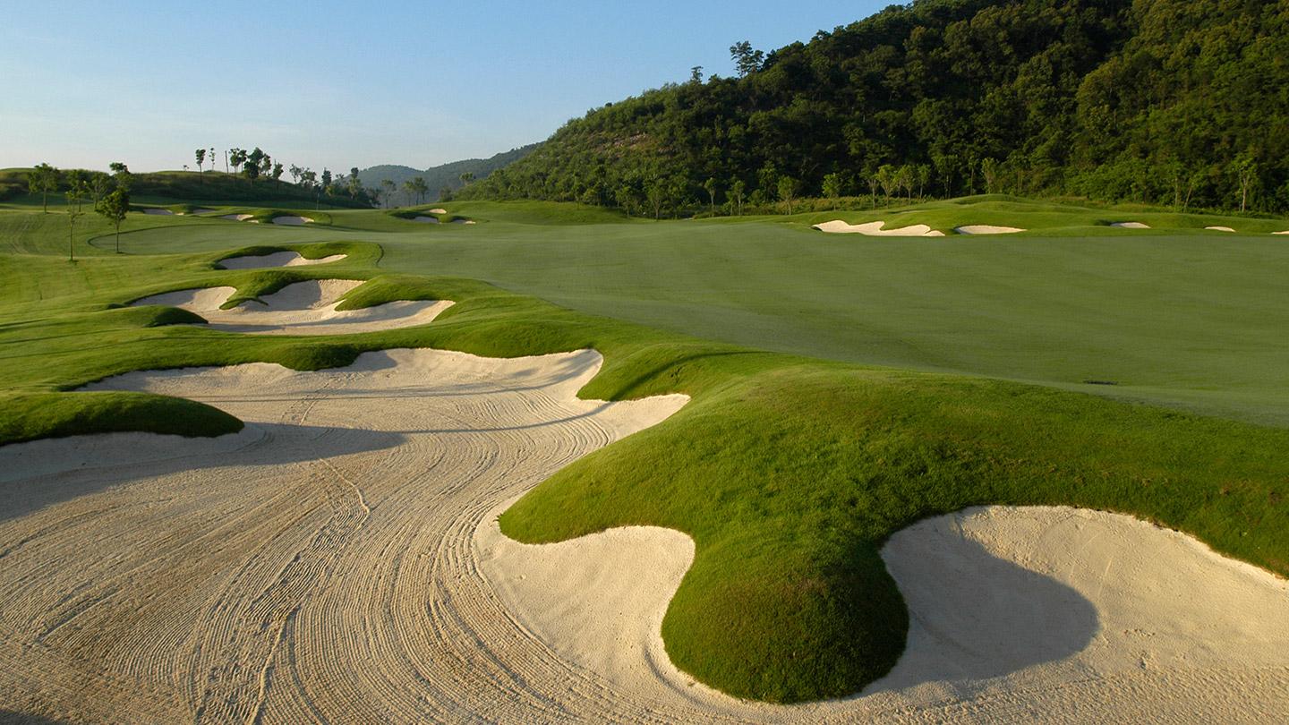 Rolling fairways lined with creatively shaped sand bunkers.