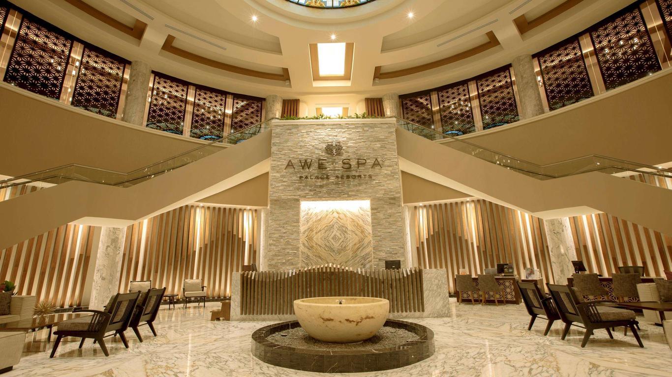 Grand staircase to the spa with seating areas downstairs