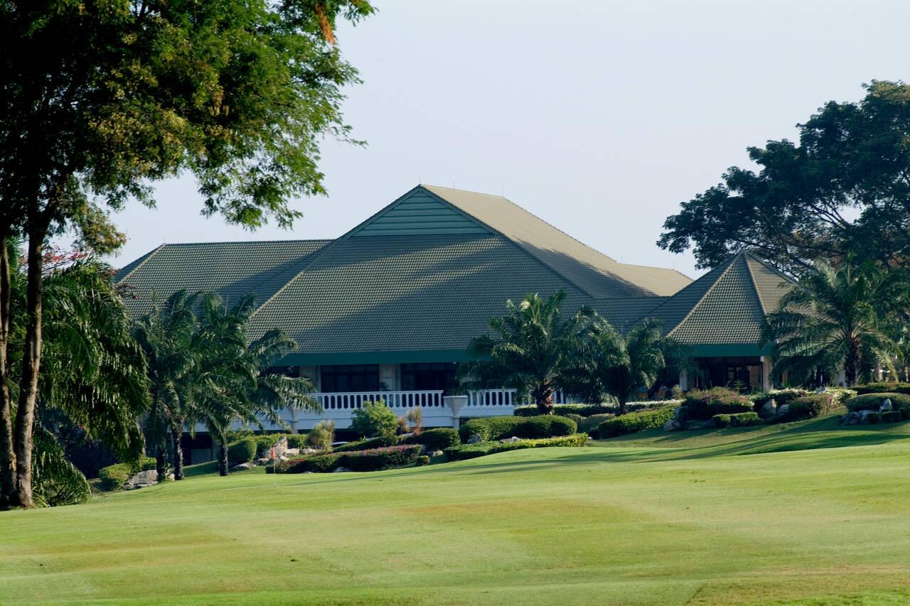 The Palm Hills clubhouse overlooking a green on the course