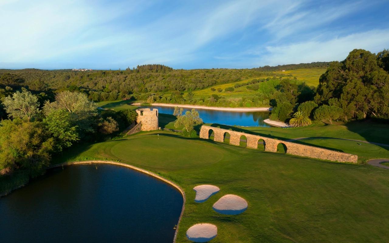 Aerial view of the green, water hazard and ruins