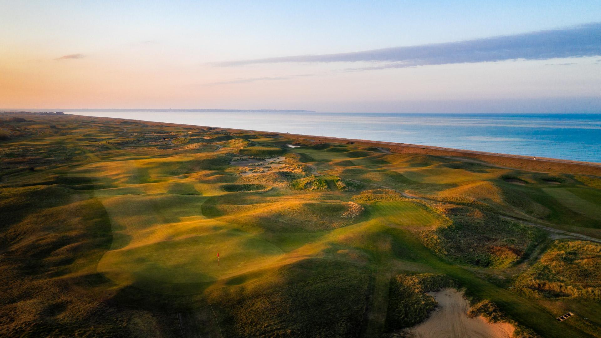 Sunset over rugged links terrain at the Royal Cinque Ports Golf Club