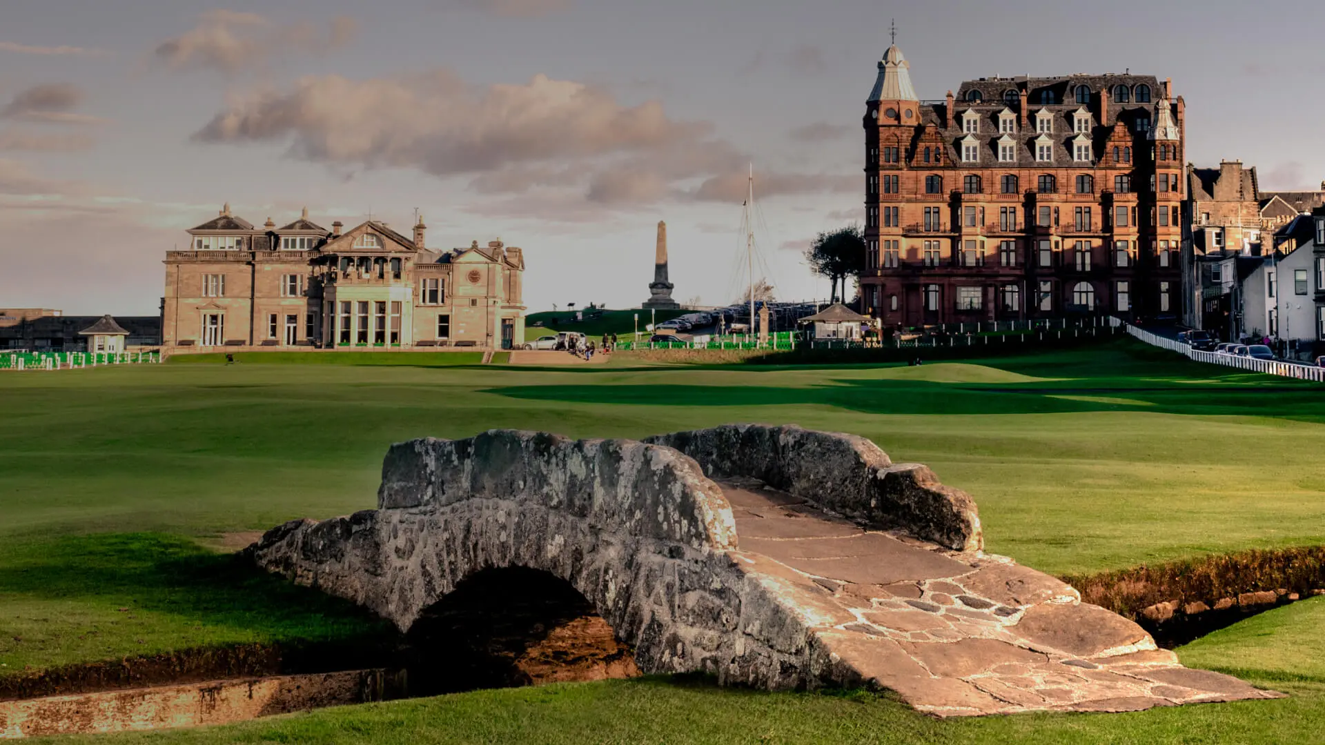 Stone bridge at the St Andrews Links going over lake that runs through the course