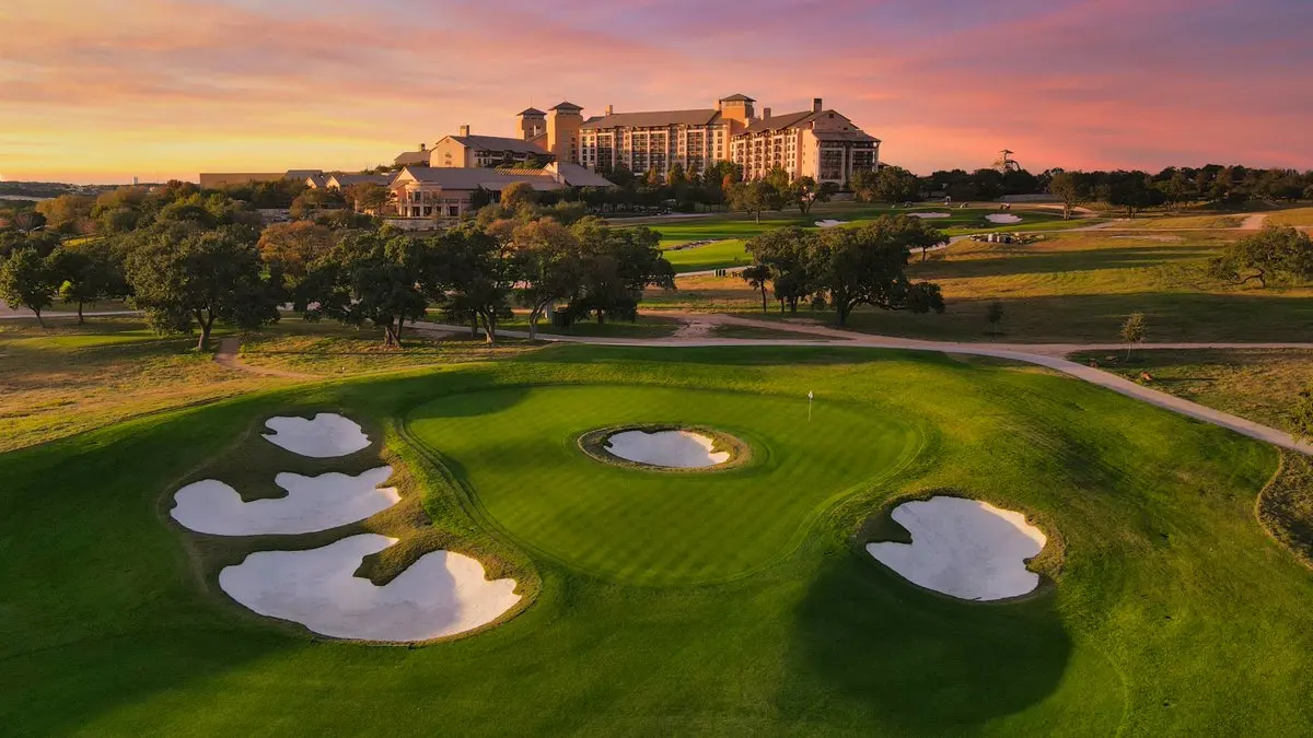 Sunset view over the resort’s signature hole with stunning Texas Hill Country scenery.