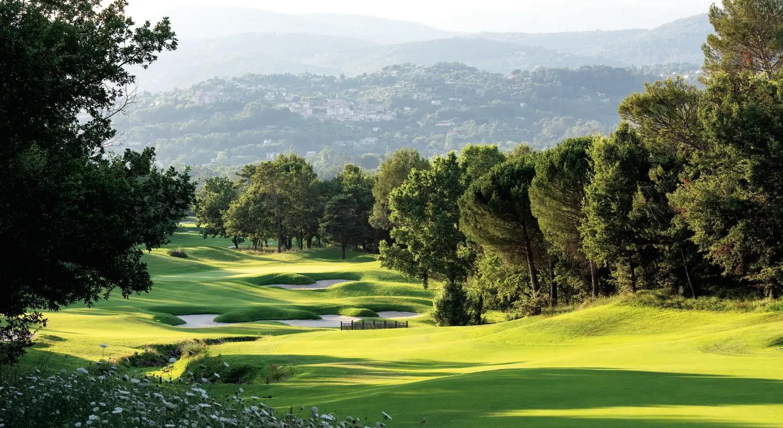 Undulating, tree-lined fairway punctuated by bunkers leading to the green