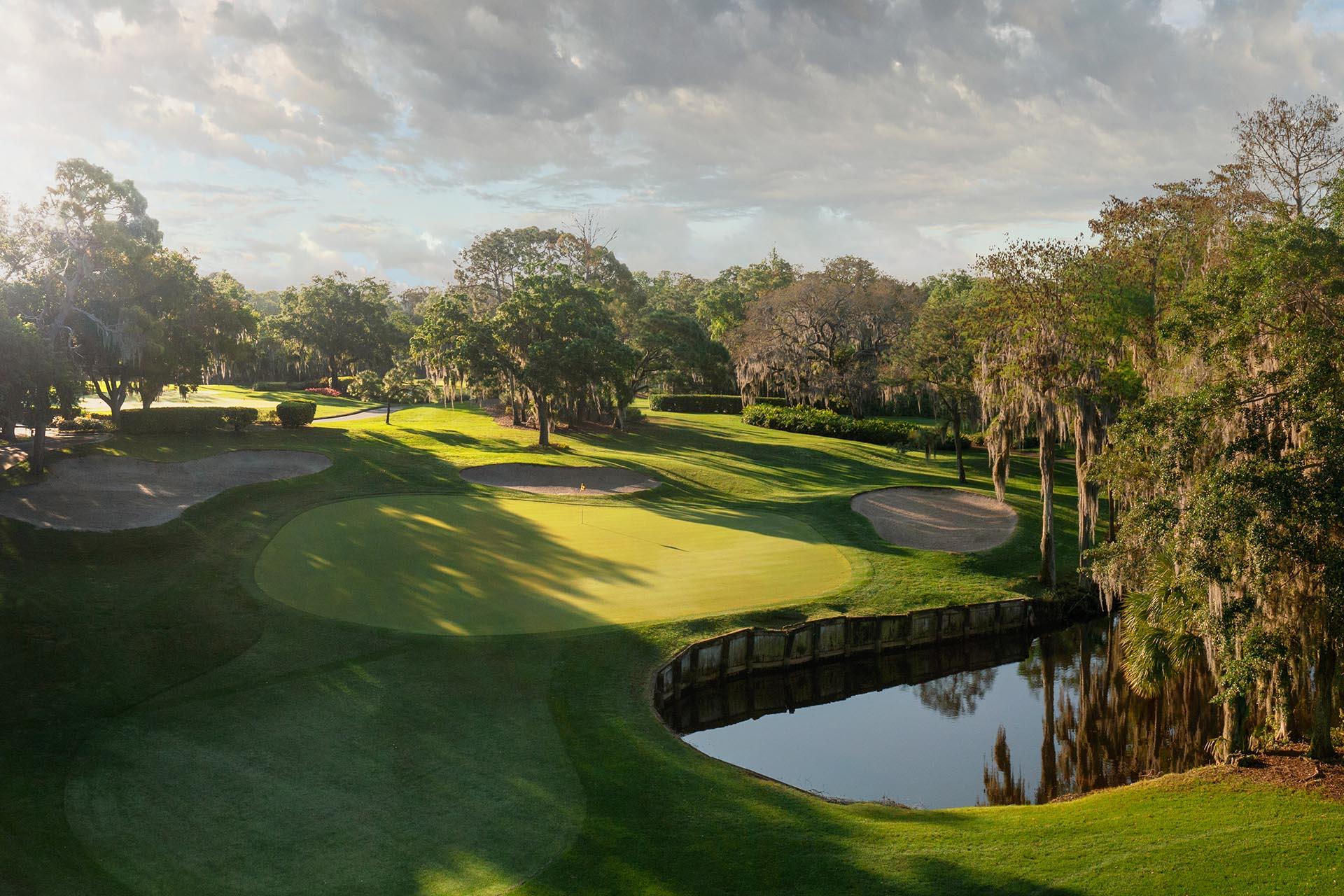 A smooth green sandwiched between a water hazard and sand bunkers